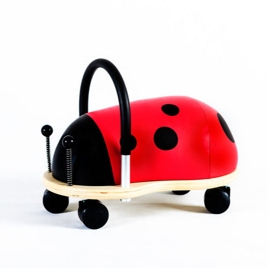 Red and black ladybug-shaped Wheely Bug Ride-on Toy.